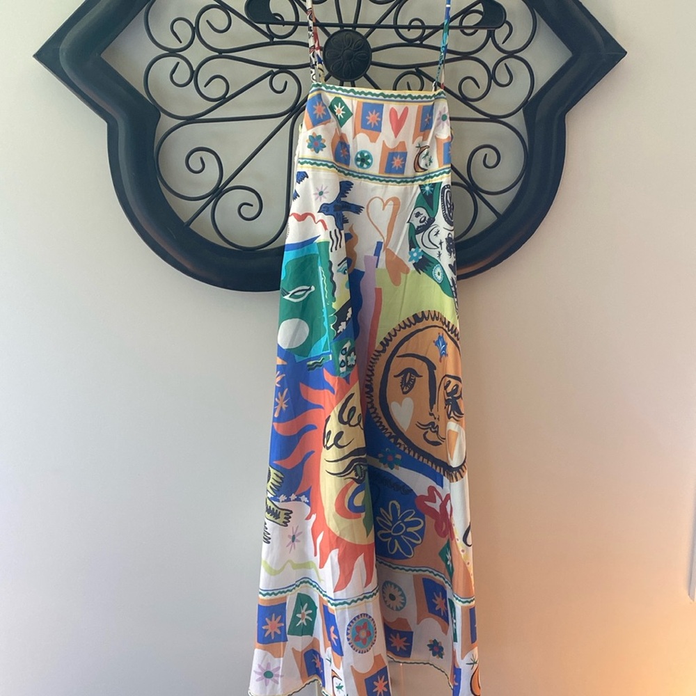 Only worn once. Very trendy pattern dress. Super cute and in great condition!